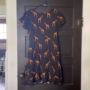 Sweet little giraffe dress. Soft and comfortable. Puffy sleeves, flattering.